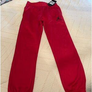 Boys Nike joggers in Red